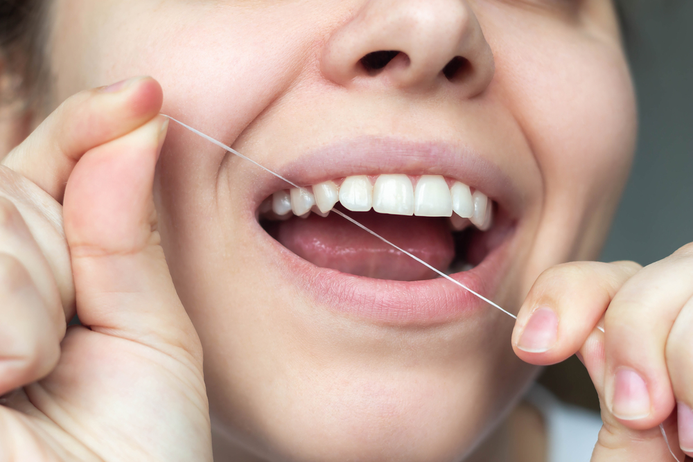 Sund mad at styre Udvinding How Often Should You Floss Your Teeth? - Wollongong Dentist 4 U